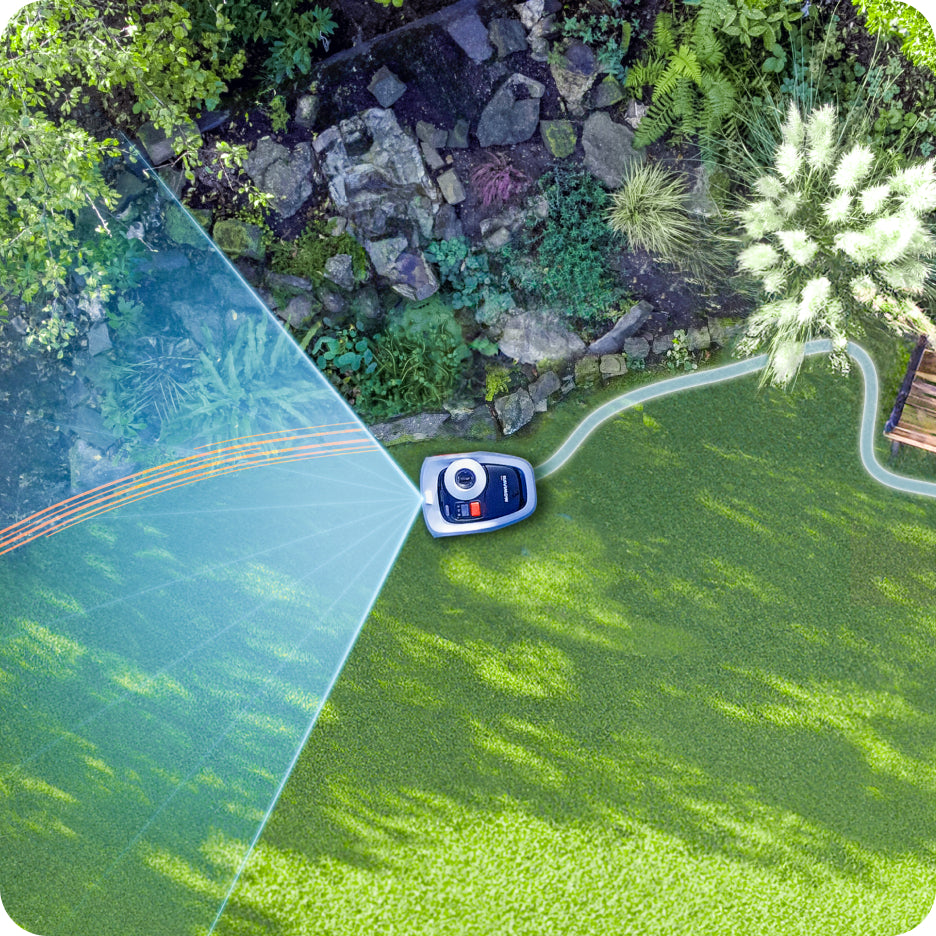 Navimow i110E robot lawn mower mows grass in the garden.
