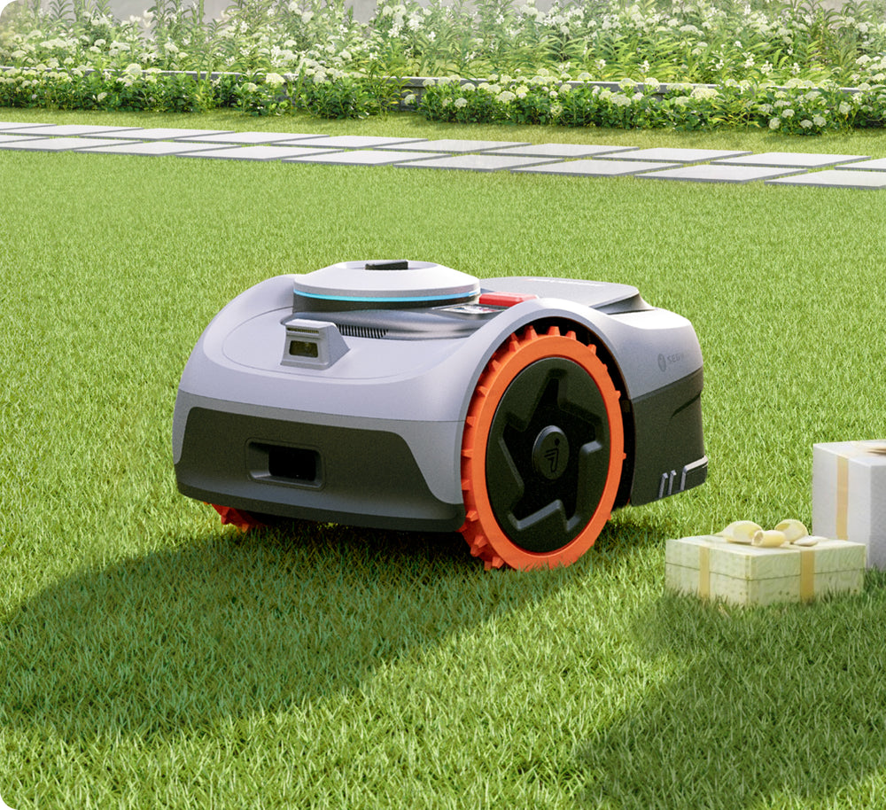 The Segway Navimow i105E robot lawn mower on green grass.