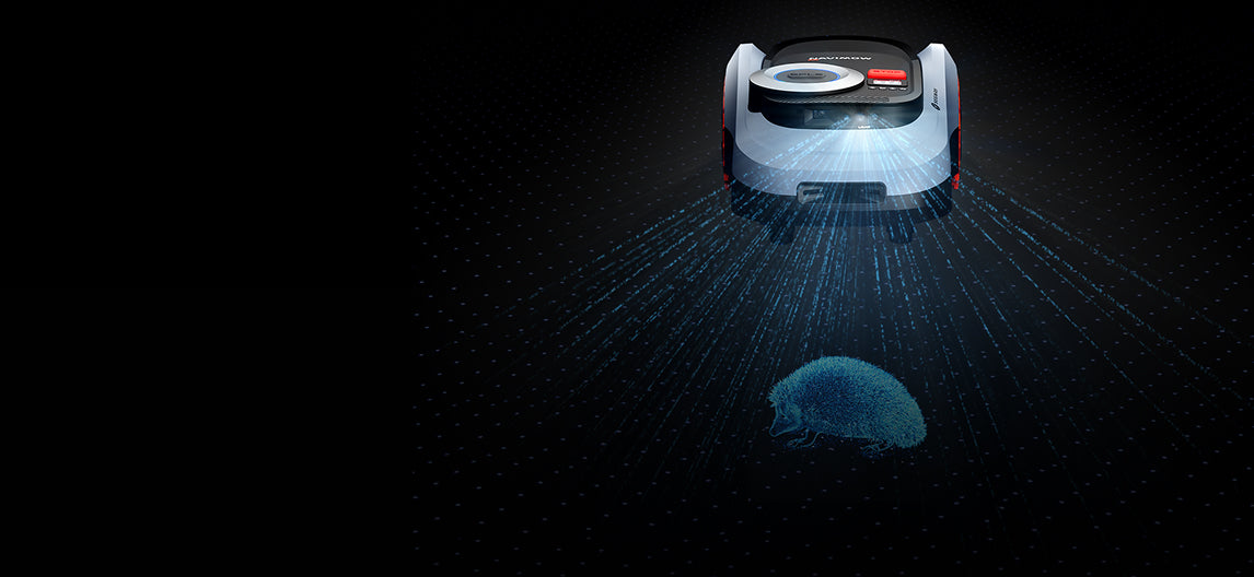 Navimow i Series robot lawn mower avoids hedgehog on grass.