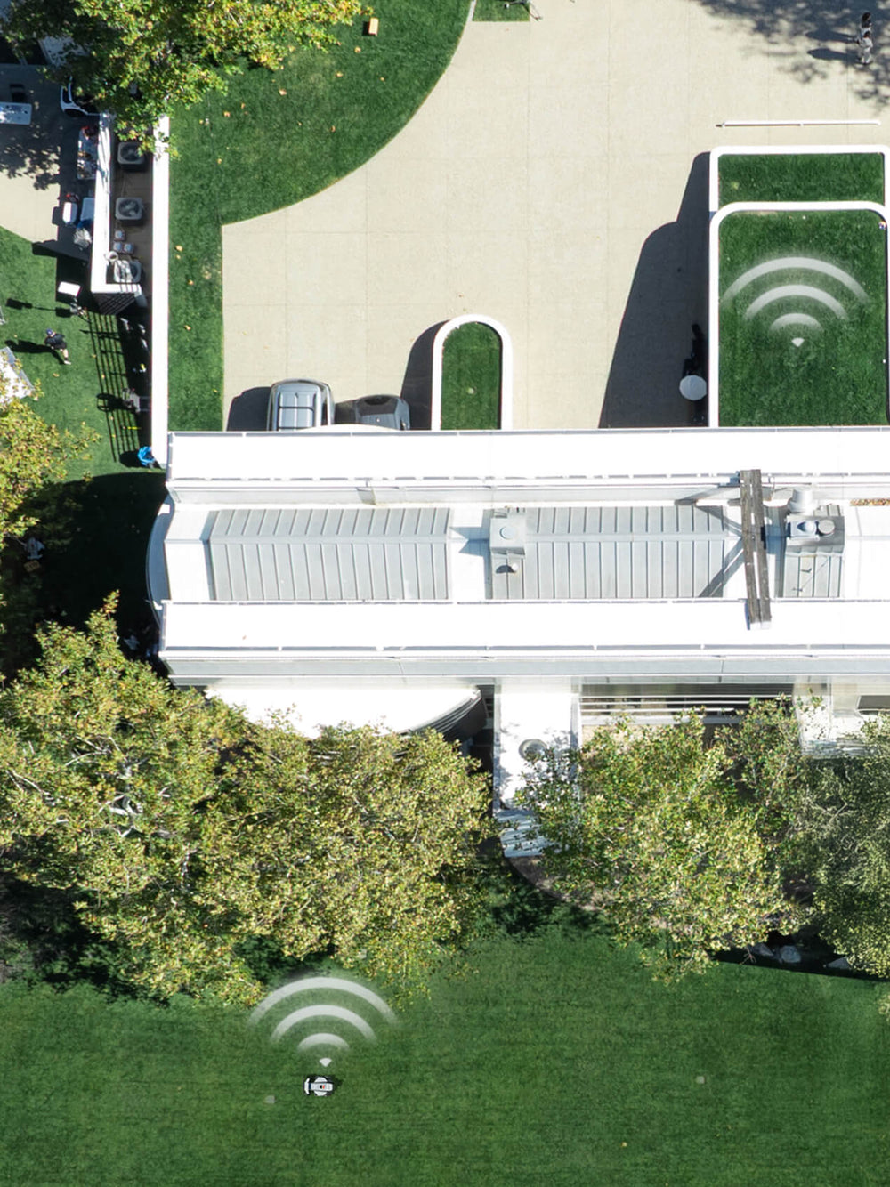 Segway Navimow i110N robot lawn mower mows the green grass.