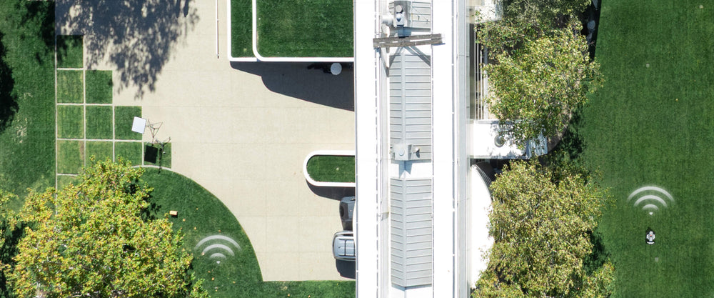 Navimow i110E robot lawn mower mows the lush green grass.