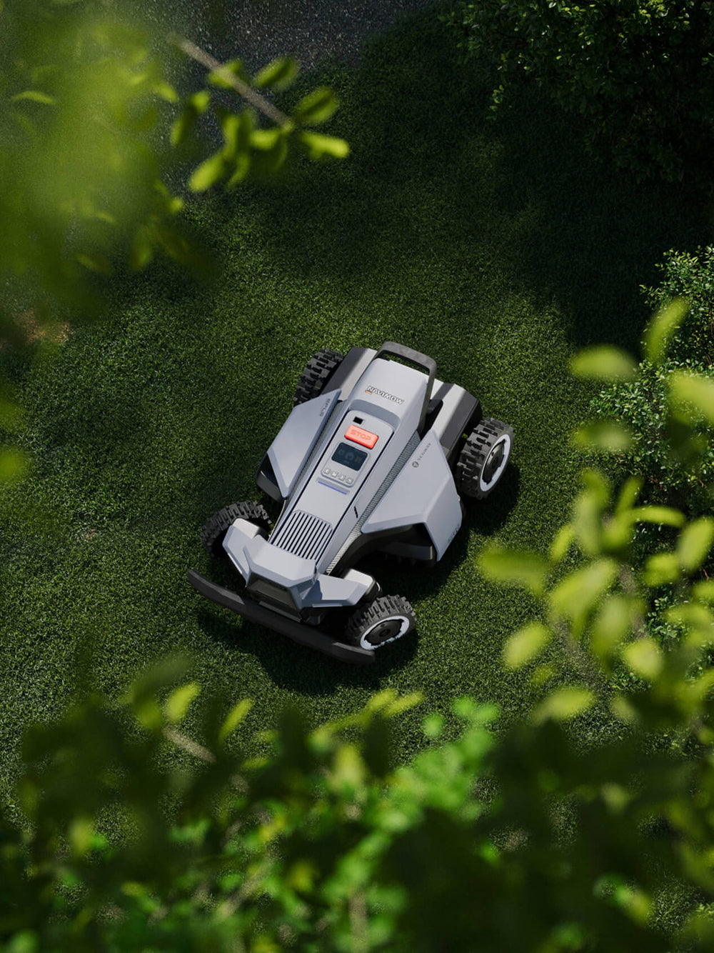 Segway Navimow i Series robot lawn mower on green grass.
