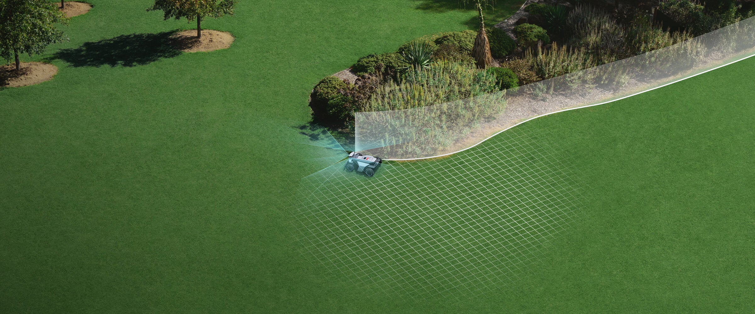 Navimow i110N robot lawn mower is mapping a green lawn.