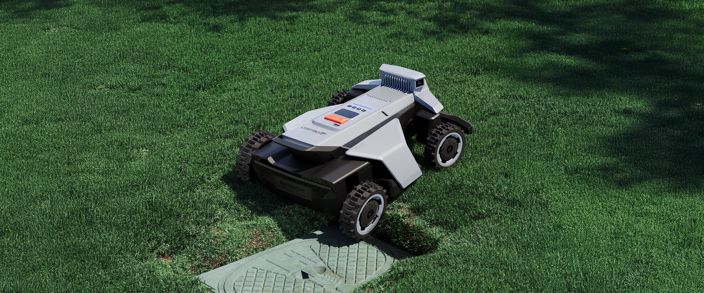 Navimow i110N robot lawn mower on a lush green lawn.